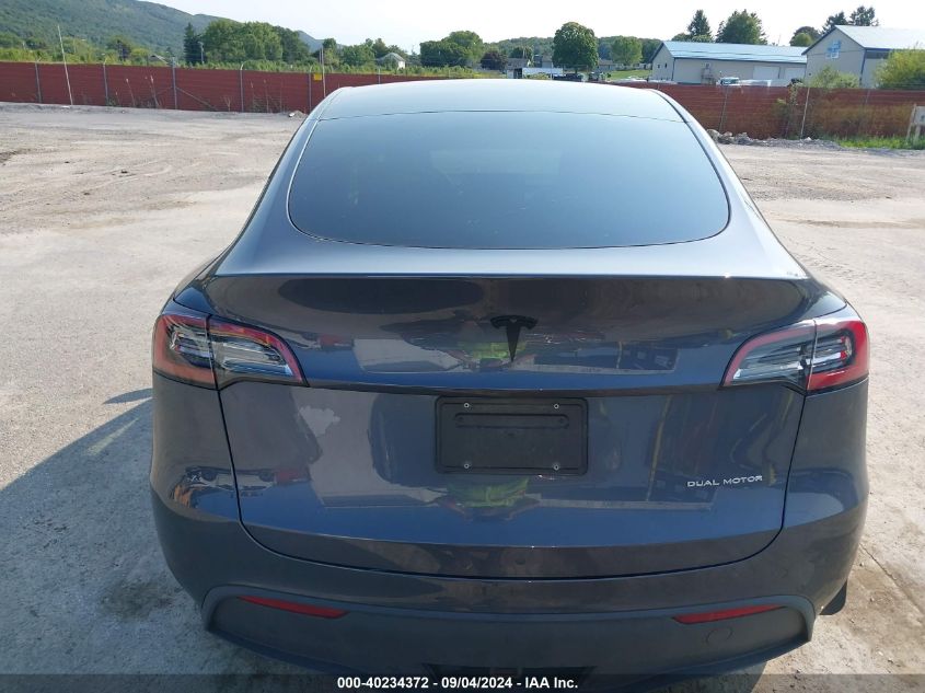 2023 Tesla Model Y Awd/Long Range Dual Motor All-Wheel Drive VIN: 7SAYGDEE4PA103251 Lot: 40234372