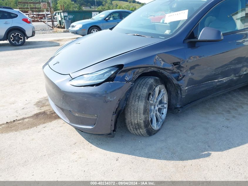 2023 Tesla Model Y Awd/Long Range Dual Motor All-Wheel Drive VIN: 7SAYGDEE4PA103251 Lot: 40234372