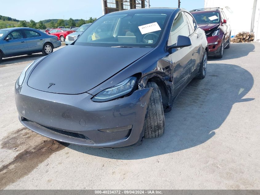 2023 Tesla Model Y Awd/Long Range Dual Motor All-Wheel Drive VIN: 7SAYGDEE4PA103251 Lot: 40234372