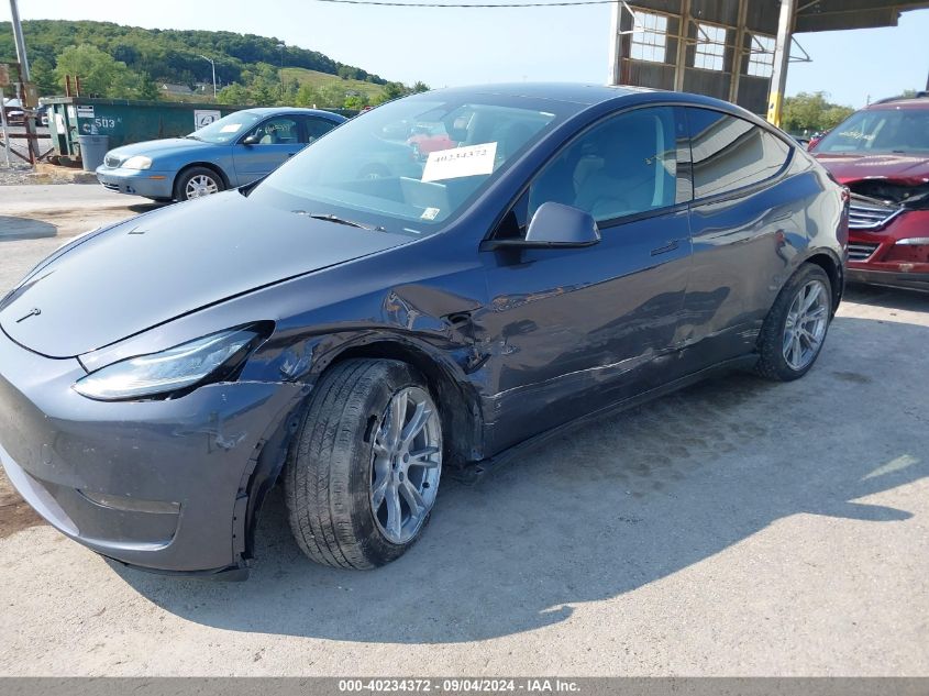 2023 Tesla Model Y Awd/Long Range Dual Motor All-Wheel Drive VIN: 7SAYGDEE4PA103251 Lot: 40234372