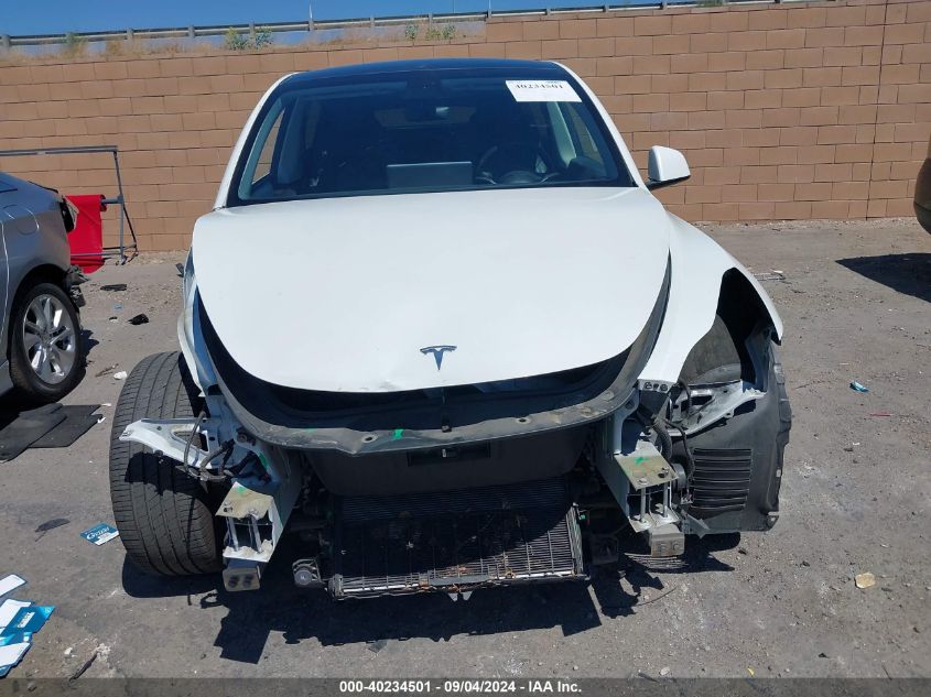 2021 Tesla Model Y Long Range Dual Motor All-Wheel Drive VIN: 5YJYGDEE1MF097792 Lot: 40234501