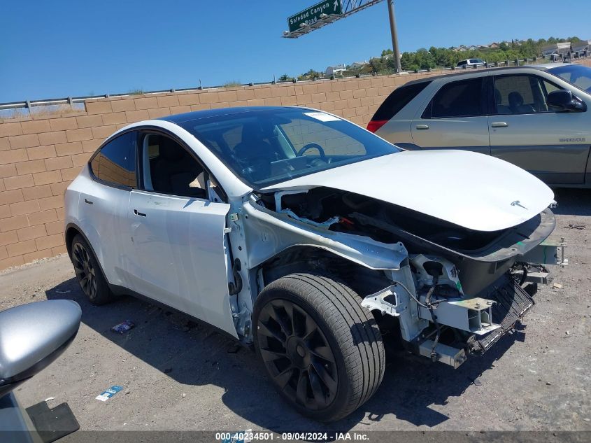 2021 Tesla Model Y Long Range Dual Motor All-Wheel Drive VIN: 5YJYGDEE1MF097792 Lot: 40234501