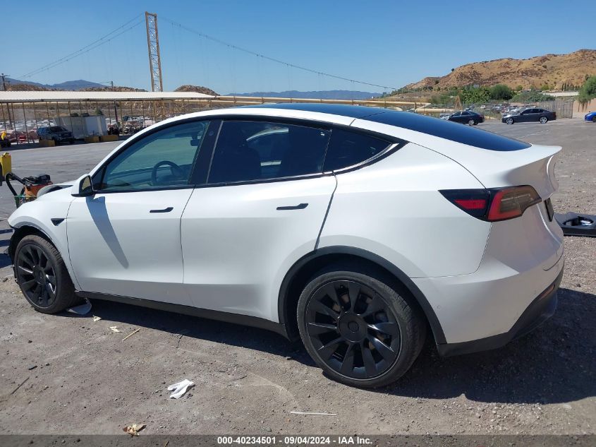 2021 Tesla Model Y Long Range Dual Motor All-Wheel Drive VIN: 5YJYGDEE1MF097792 Lot: 40234501