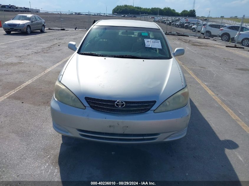 2004 Toyota Camry Le VIN: 4T1BE32K74U290516 Lot: 40236010