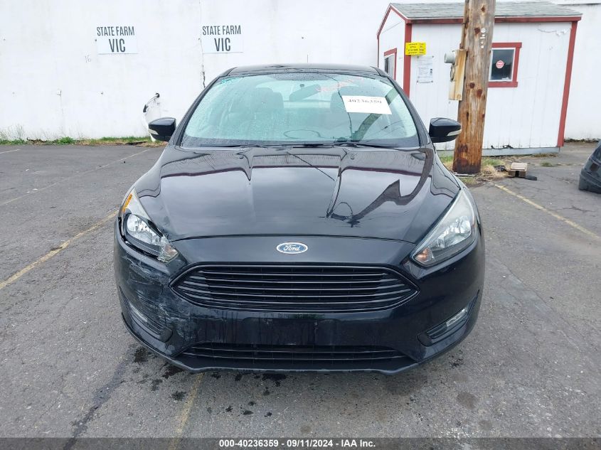 2016 Ford Focus Se VIN: 1FADP3FE8GL329299 Lot: 40236359