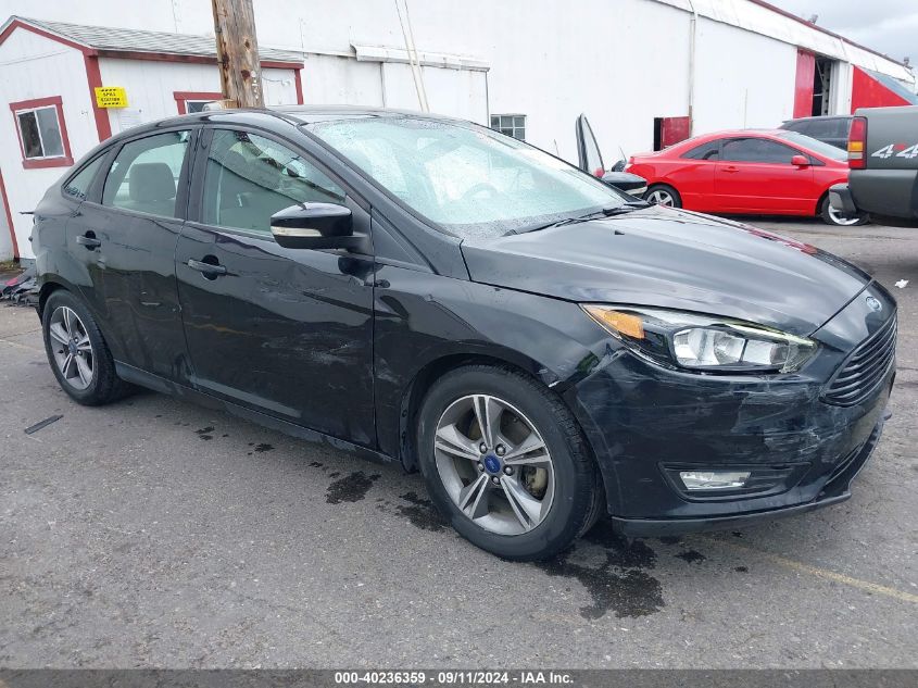 2016 Ford Focus Se VIN: 1FADP3FE8GL329299 Lot: 40236359