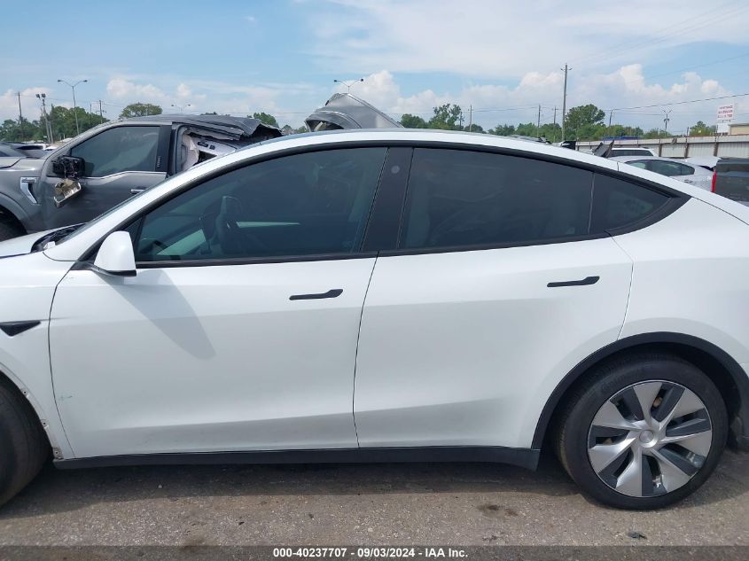 2023 Tesla Model Y Awd/Long Range Dual Motor All-Wheel Drive VIN: 7SAYGDEE1PF612720 Lot: 40237707