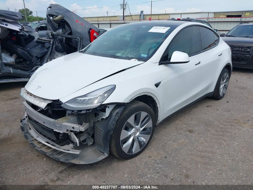 2023 Tesla Model Y Awd/Long Range Dual Motor All-Wheel Drive VIN: 7SAYGDEE1PF612720 Lot: 40237707