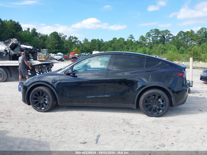 2023 Tesla Model Y Awd/Long Range Dual Motor All-Wheel Drive VIN: 7SAYGDEE0PA182305 Lot: 40239939