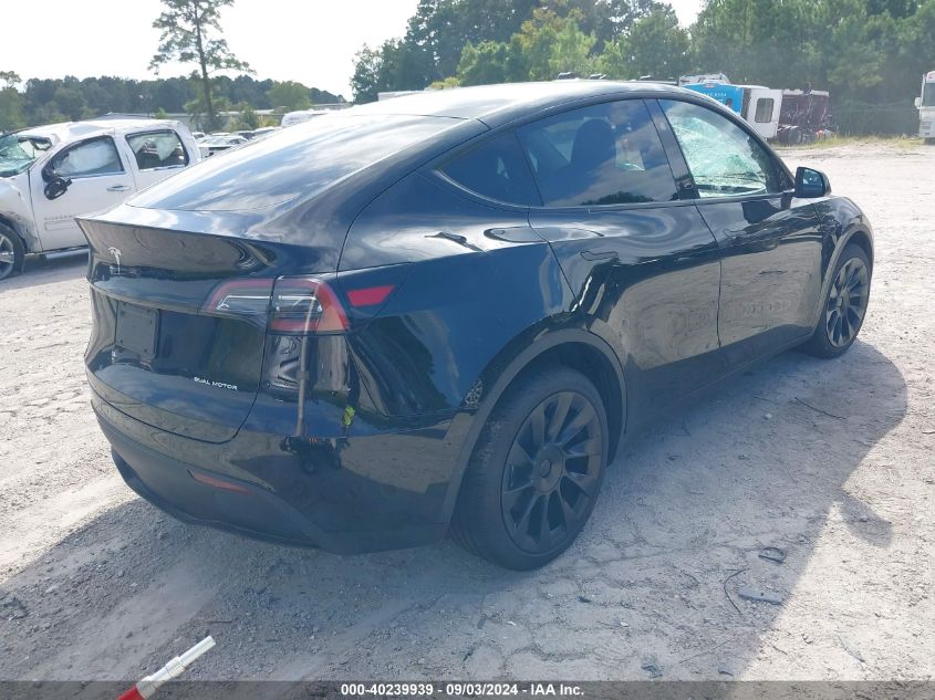 2023 Tesla Model Y Awd/Long Range Dual Motor All-Wheel Drive VIN: 7SAYGDEE0PA182305 Lot: 40239939