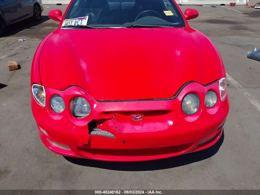 2000 Hyundai Tiburon Base Pkg 1, 2 5/Base Pkg 3 4 VIN: KMHJG35FXYU217442 Lot: 40240162