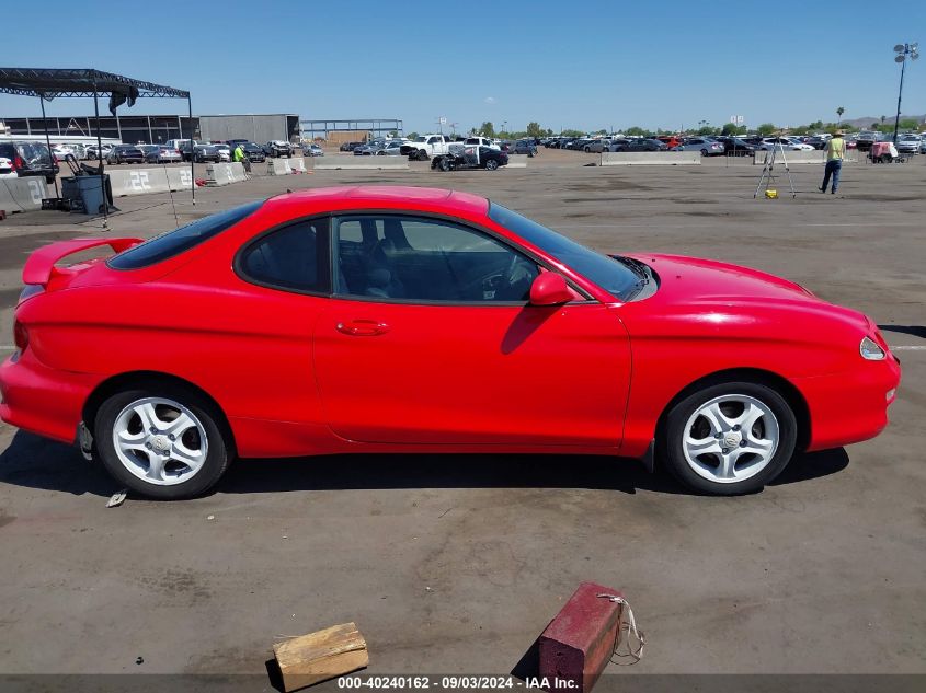 2000 Hyundai Tiburon Base Pkg 1, 2 5/Base Pkg 3 4 VIN: KMHJG35FXYU217442 Lot: 40240162