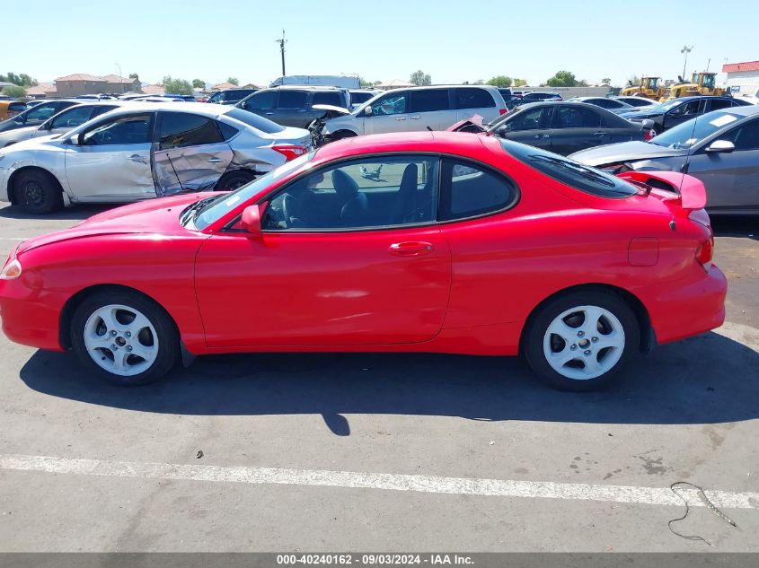 2000 Hyundai Tiburon Base Pkg 1, 2 5/Base Pkg 3 4 VIN: KMHJG35FXYU217442 Lot: 40240162