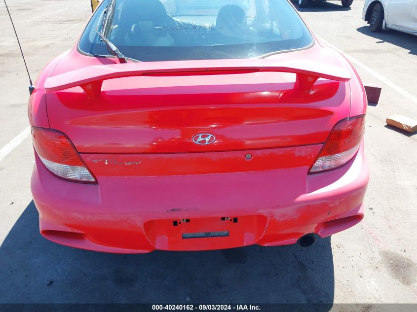 2000 Hyundai Tiburon Base Pkg 1, 2 5/Base Pkg 3 4 VIN: KMHJG35FXYU217442 Lot: 40240162