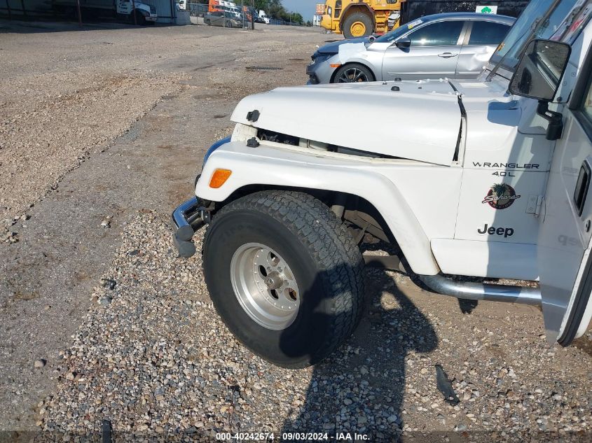 1999 Jeep Wrangler Sahara VIN: 1J4FY49S7XP422227 Lot: 40242674