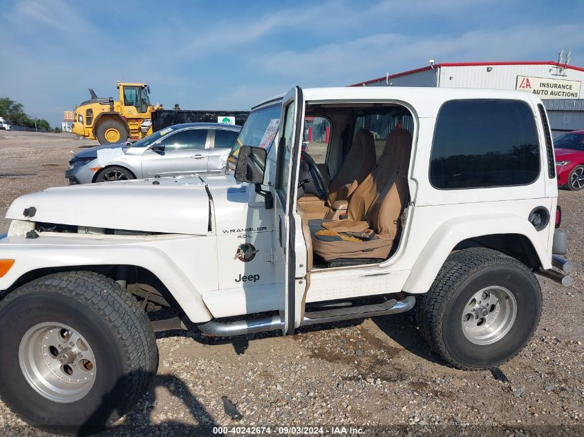 1999 Jeep Wrangler Sahara VIN: 1J4FY49S7XP422227 Lot: 40242674