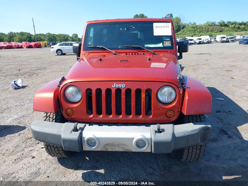 2009 Jeep Wrangler Unlimited Sahara VIN: 1J4GA59129L772669 Lot: 40243529