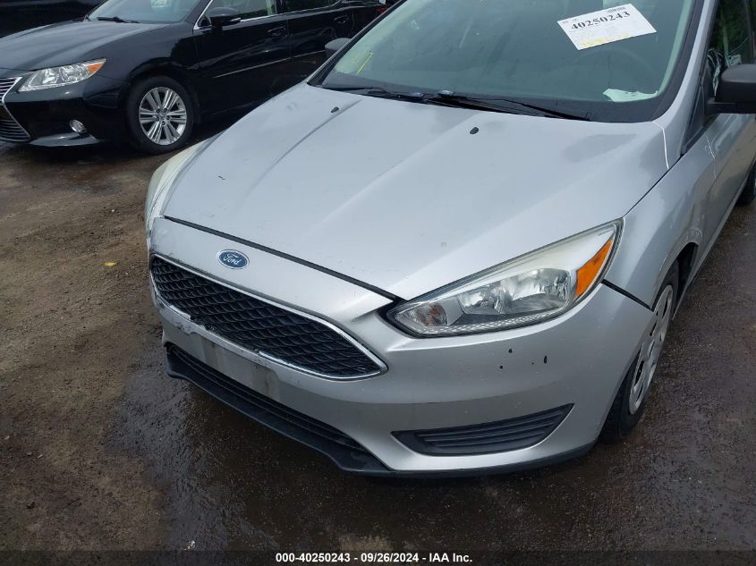 2015 Ford Focus S VIN: 1FADP3E21FL273647 Lot: 40250243