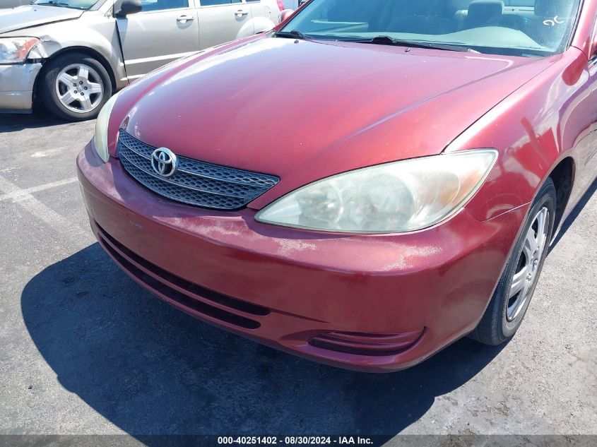 2002 Toyota Camry Le VIN: JTDBE32K920067449 Lot: 40251402