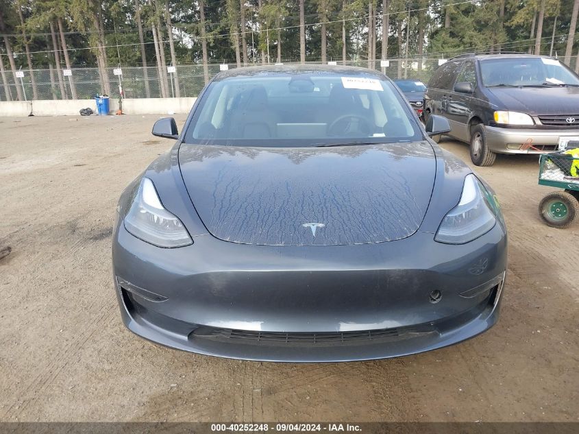 2023 Tesla Model 3 Long Range Dual Motor All-Wheel Drive VIN: 5YJ3E1EB2PF667694 Lot: 40252248