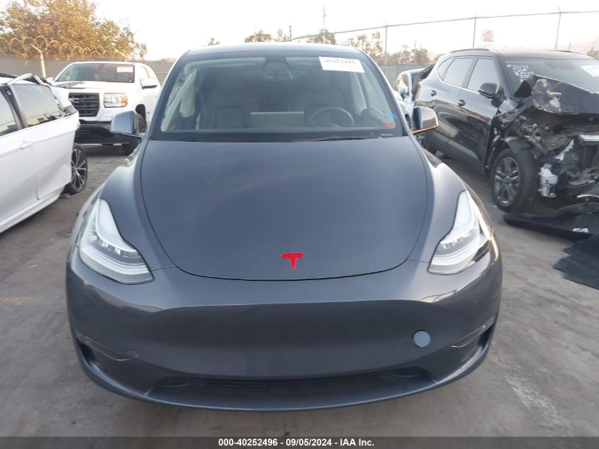 2023 Tesla Model Y Awd/Long Range Dual Motor All-Wheel Drive VIN: 7SAYGDEE1PA074887 Lot: 40252496