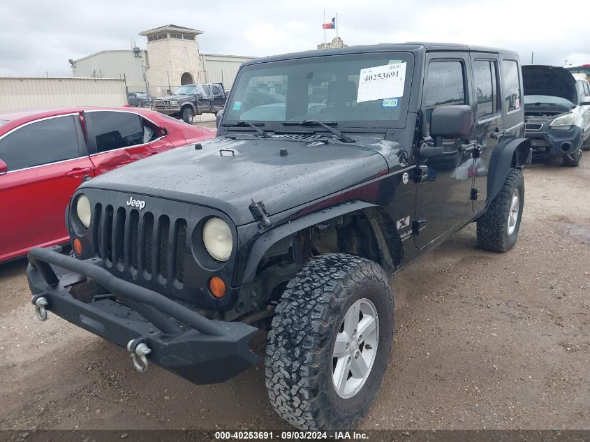 2008 Jeep Wrangler Unlimited X VIN: 1J4GA39108L537772 Lot: 40253691