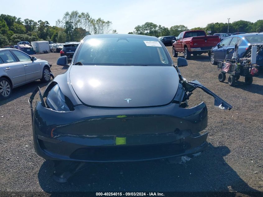 2024 Tesla Model Y Long Range Dual Motor All-Wheel Drive VIN: 7SAYGDEE0RA301439 Lot: 40254015