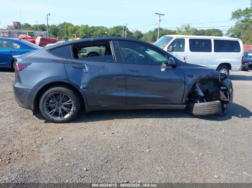 2024 Tesla Model Y Long Range Dual Motor All-Wheel Drive VIN: 7SAYGDEE0RA301439 Lot: 40254015