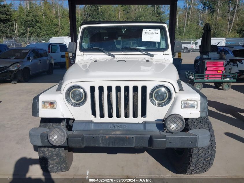 2000 Jeep Wrangler Sport VIN: 1J4FA49S5YP744807 Lot: 40254276