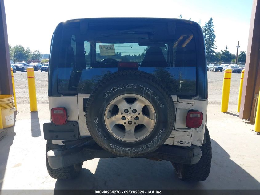 2000 Jeep Wrangler Sport VIN: 1J4FA49S5YP744807 Lot: 40254276