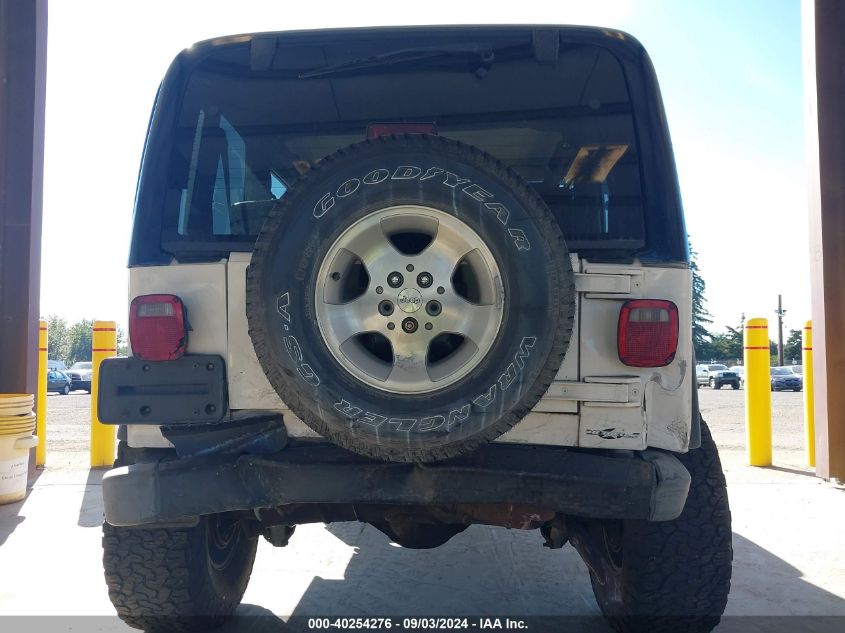 2000 Jeep Wrangler Sport VIN: 1J4FA49S5YP744807 Lot: 40254276