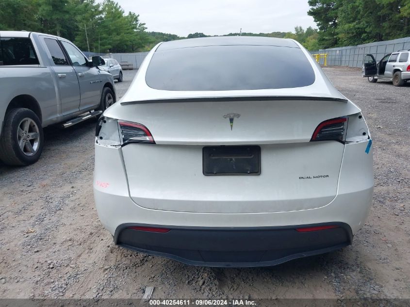 2023 Tesla Model Y Awd/Long Range Dual Motor All-Wheel Drive VIN: 7SAYGDEE0PA059930 Lot: 40254611