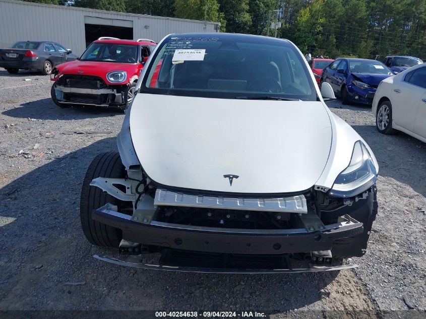 2023 Tesla Model Y Awd/Long Range Dual Motor All-Wheel Drive VIN: 7SAYGAEE7PF701268 Lot: 40254638