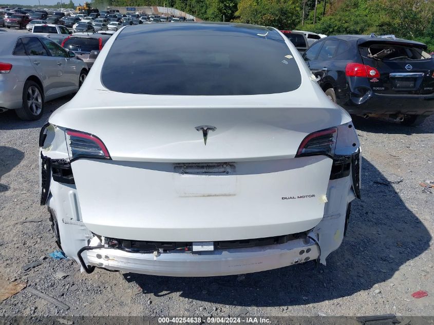 2023 Tesla Model Y Awd/Long Range Dual Motor All-Wheel Drive VIN: 7SAYGAEE7PF701268 Lot: 40254638