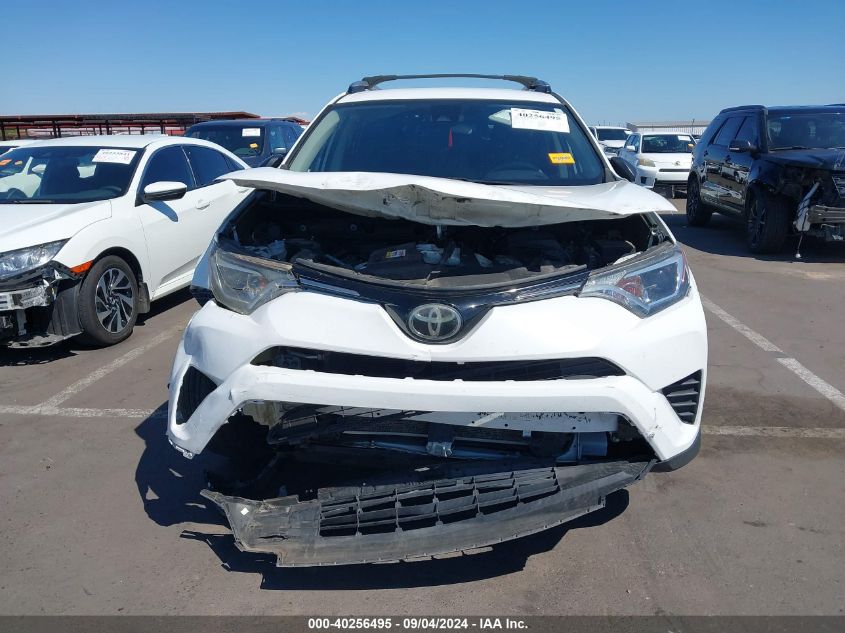 2018 Toyota Rav4 Le VIN: JTMZFREVXJJ205674 Lot: 40256495