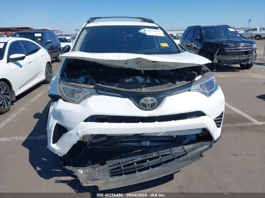 2018 Toyota Rav4 Le VIN: JTMZFREVXJJ205674 Lot: 40256495