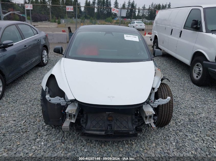 2021 Tesla Model 3 Standard Range Plus Rear-Wheel Drive VIN: 5YJ3E1EA4MF929878 Lot: 40257146