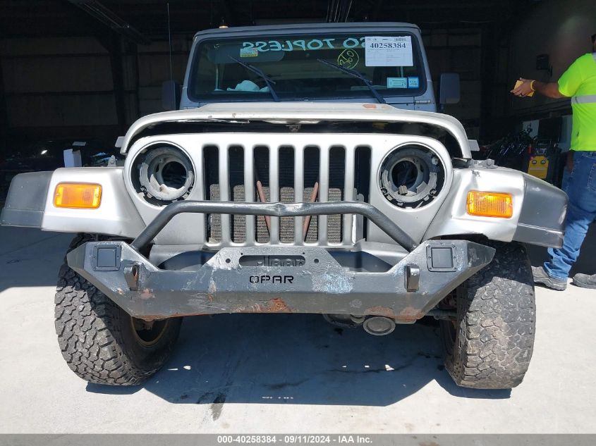 2000 Jeep Wrangler Sport VIN: 1J4FA49SXYP754622 Lot: 40258384