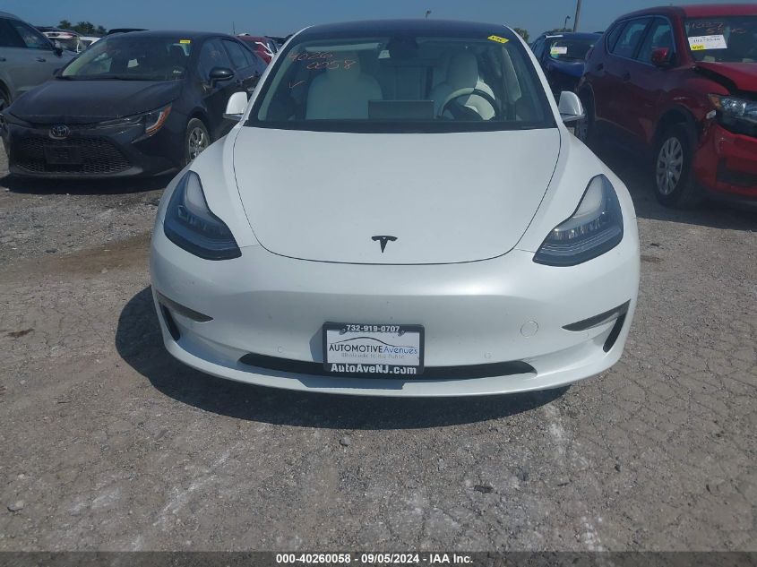 2018 Tesla Model 3 Long Range/Performance VIN: 5YJ3E1EB2JF101283 Lot: 40260058