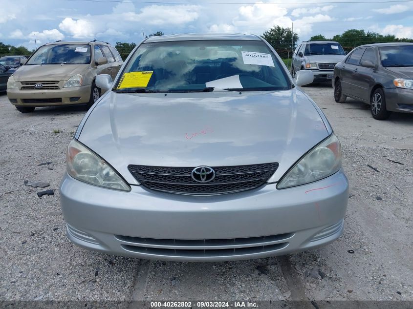 2002 Toyota Camry Xle VIN: 4T1BE32K72U637310 Lot: 40262802