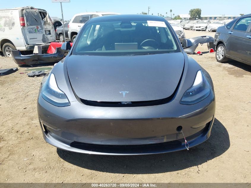 2023 Tesla Model 3 Long Range Dual Motor All-Wheel Drive VIN: 5YJ3E1EB5PF700106 Lot: 40263720