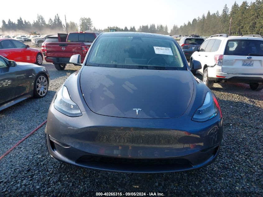 2023 Tesla Model Y Awd/Long Range Dual Motor All-Wheel Drive VIN: 7SAYGAEE8PF685887 Lot: 40265315