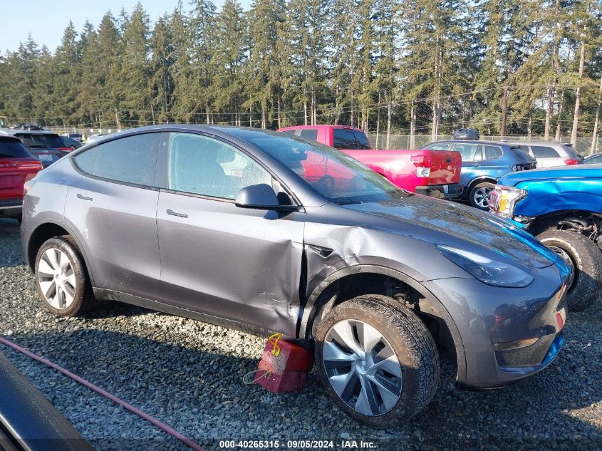 2023 Tesla Model Y Awd/Long Range Dual Motor All-Wheel Drive VIN: 7SAYGAEE8PF685887 Lot: 40265315