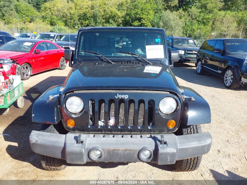 2007 Jeep Wrangler Unlimited Sahara VIN: 1J4GA59157L194211 Lot: 40267678