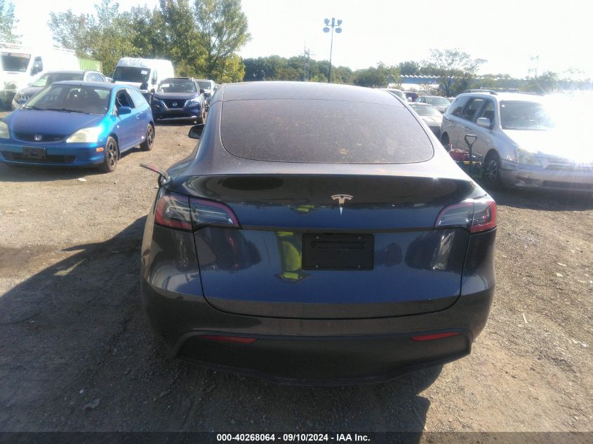 2023 Tesla Model Y VIN: 7SAYGDED5PF933179 Lot: 40268064