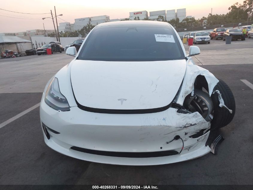 2018 Tesla Model 3 Long Range/Performance VIN: 5YJ3E1EB7JF072718 Lot: 40268331