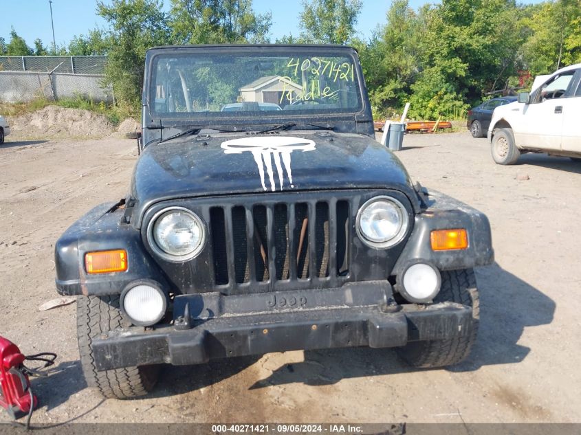 2001 Jeep Wrangler Sahara VIN: 1J4FA59S21P306595 Lot: 40271421