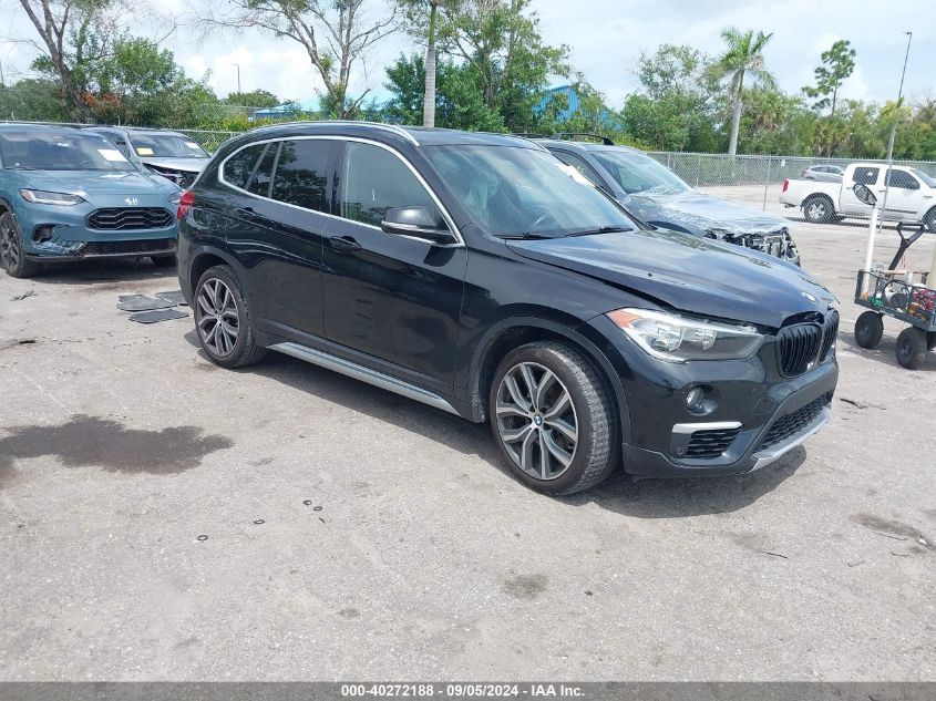 WBXHU7C30J3F04236 2018 BMW X1 - Image 1