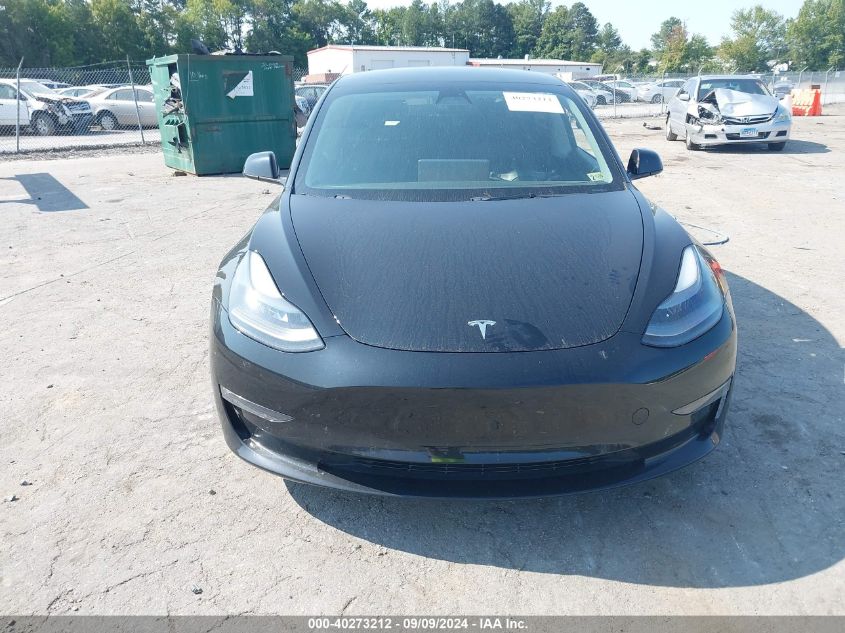 2021 Tesla Model 3 Standard Range Plus Rear-Wheel Drive VIN: 5YJ3E1EA1MF087131 Lot: 40273212