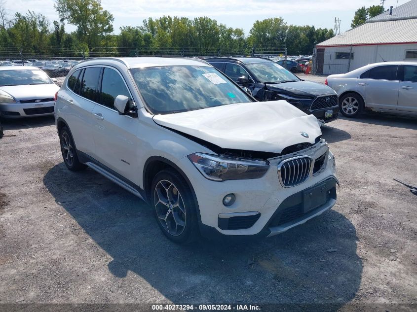 WBXHT3C36J5K27024 2018 BMW X1 - Image 1